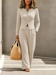 Chic solid knit button cardigan and wide leg pants lounge set for women autumn fashion.