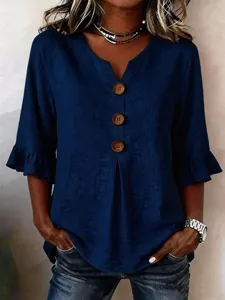 Plus size loose V-neck casual shirt with large buttons and ruffle sleeves for women.