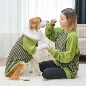 Matching pet and owner striped long sleeve shirts, cozy casual crewneck outfits for dogs and owners.