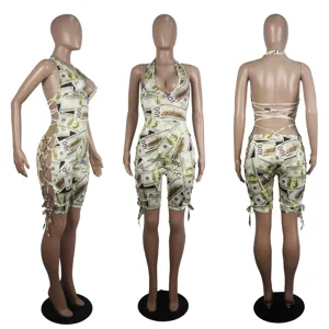 Women's sexy halter neck lace-up dollar print cutout romper jumpsuit detail view.