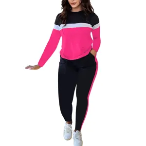 Women colorblock long sleeve top and pants tracksuit set casual outfit activewear.