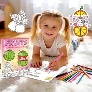 Detailed view of a young child coloring a creative foldable fruit theme activity book for kids