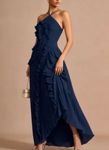 Detailed view of dark blue pleated halter maxi dress with ruffles and asymmetrical hem.