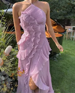 Elegant lavender halter pleated long dress with cascading ruffles for women party wear.