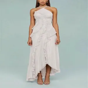 Detailed view of women elegant halter neck pleated maxi dress party evening wear outfit apparel.