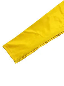 Yellow long sleeve top sleeve detail close up, soft fabric and neat stitching design.