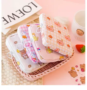 Cute portable sanitary napkin storage bag with zipper, kawaii cartoon design for daily use.