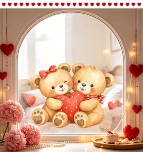 Close-up of cute Valentine's bears holding heart window decal in cozy room setting