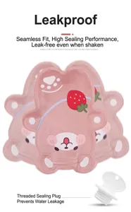 Close-up detail of the cute pink cartoon bear plush hot water bag with sealing plug features.