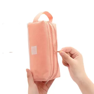 Korean style large capacity double layer oxford cloth pencil pouch with convenient hand strap.