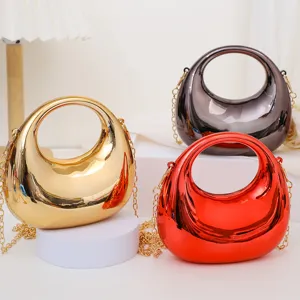 Stylish metallic crescent mini crossbody bag with chain strap in three chic colors.