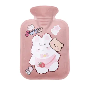 Cute plush hot water bag with pink cartoon rabbit and bear design for winter warmth.