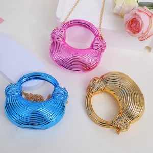 Fashion acrylic ramen dumpling bag with metallic chain, trendy metal handle handbag for women.