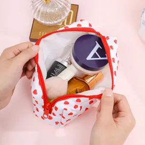 Large capacity portable makeup pouch for women, cute red heart print cosmetic bag.