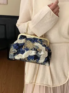 Borsa a conchiglia ricamata vintage con motivo gru e chiusura oro