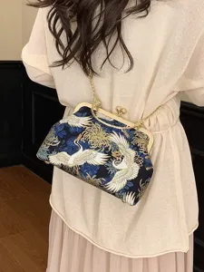 Elegante borsa a conchiglia ricamata vintage con motivo a gru e chiusura bacio dorata
