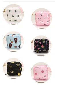 Cute cartoon sanitary napkin storage pouch large capacity portable period makeup storage bag.