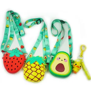 Niedliche Silikon Frucht Umhängetaschen Set für Kinder, inklusive Erdbeere und Ananas.