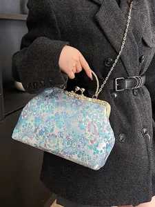 Elegante borsa a mano vintage in stile cinese con stampa floreale e chiusura in metallo.