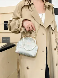 Elegant silk floral handbag with pearl handle and gold chain strap for Hanfu or Qipao.