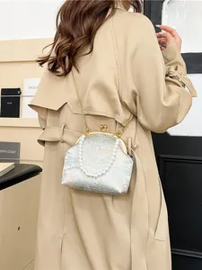 Elegant floral embroidered silk crossbody bag with pearl handle for Hanfu or Qipao outfits