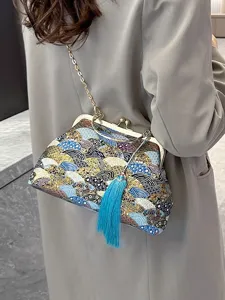 Borsa vintage in tessuto stile cinese con ricamo a onde e nappa blu lunga decorativa