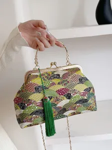 Borsa a mano vintage in tessuto stile cinese con un elegante ciondolo a nappa verde