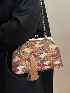 Borsa a mano vintage in stile cinese con motivo a onde, nappa decorativa e chiusura a scatto