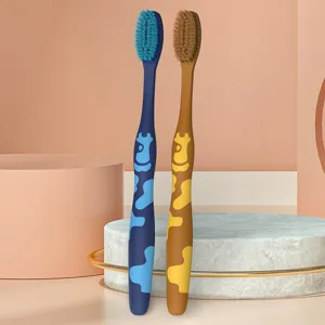 Detail view of premium adult soft bristle toothbrush featuring high density volcanic silk.