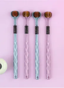 Detailed view of the three-sided adult toothbrush featuring soft bristles for deep cleaning.