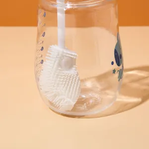 Gedetailleerd overzicht van helder glas met blauwe maatverdeling en witte siliconen borstel.