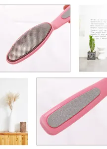 Pink double-sided foot file and callus remover tool detail view, professional foot care tool.