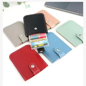 Colorful PU leather card holder with snap button, portable multi-slot wallet for women.
