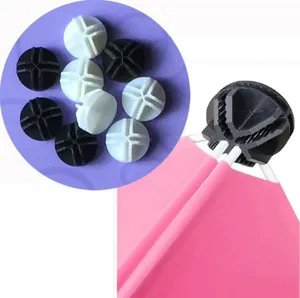 Plastic wardrobe storage rack cross connector clips, modular cube closet parts, black and white.