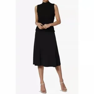 Detailed view of the elegant black mock-neck sleeveless top and mid-length flared skirt set.
