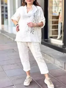 Casual two-piece set featuring letter print, half-sleeve top and loose long pants.