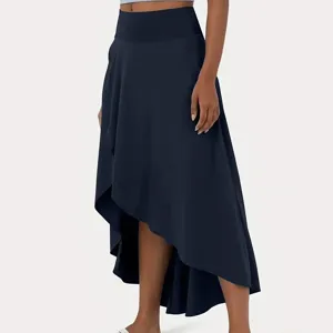 High-waisted asymmetrical long skirt in dark navy blue, elegant draped fabric for summer.