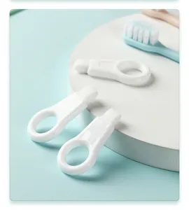 Portable tooth cleaning eraser detail view, white finger ring design for easy dental stain removal.