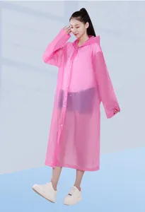 Pink translucent EVA raincoat detail showing long sleeve, hood, and button closure design.