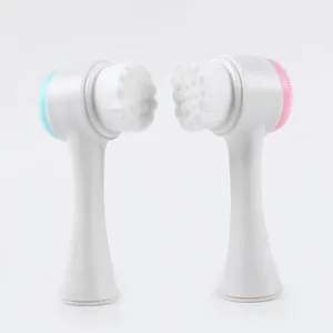 Brosse nettoyante pour le visage manuelle double face à poils doux et tête de massage en silicone.