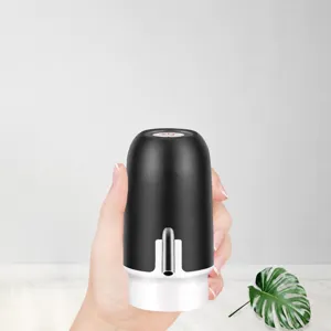 Portable electric water dispenser for bottled water, rechargeable mini pump for home use.