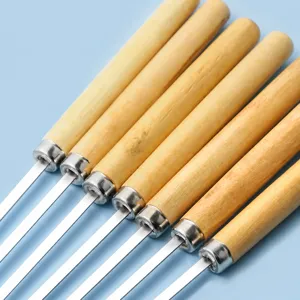 Stainless steel wooden handle BBQ skewers, heat-resistant sticks for camping and grilling.