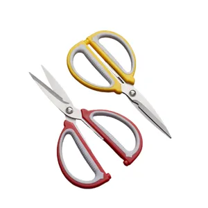 Multi-purpose stainless steel kitchen scissors with dual-color rubber handles for food.