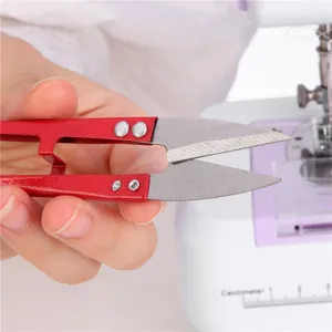 Compact U-shaped embroidery scissors for precise thread cutting and sewing DIY crafts.