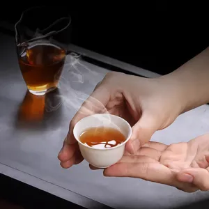 Small kung fu tea cup, eco-friendly rice husk tea tasting cup, main product view in hand.