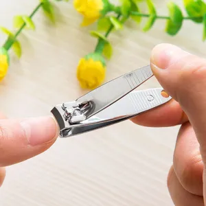 Stainless steel nail clipper detail view, durable metal manicure tool for daily home use.