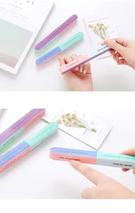 Detailed shot of 7-sided nail buffer file, showing color-coded grit steps for shaping and polishing.