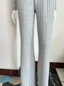 Grey ribbed long sleeve top and flared trousers two piece set detail showing fabric.