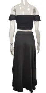 Women's black off shoulder strapless crop top and long skirt two piece outfit summer set.