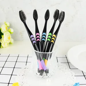 Black soft bristle toothbrushes set with colorful grip handles for daily family use clean.